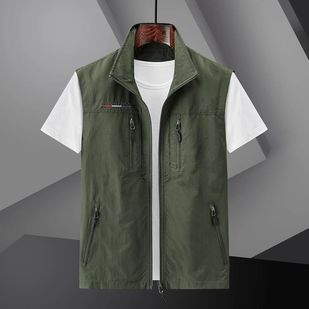 Men's beige utility vest classic fit with multiple pockets, lightweight outdoor travel layer