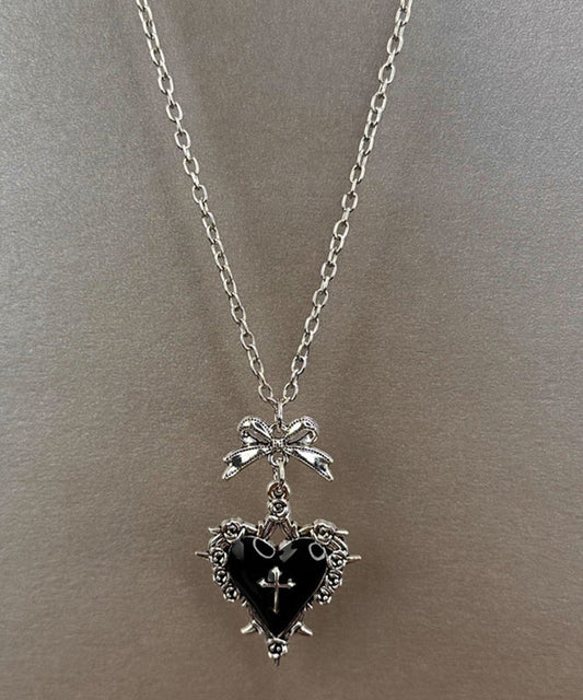 Collier avec pendentif en forme de nœud en acier inoxydable noir Art - Urbann-Vibe