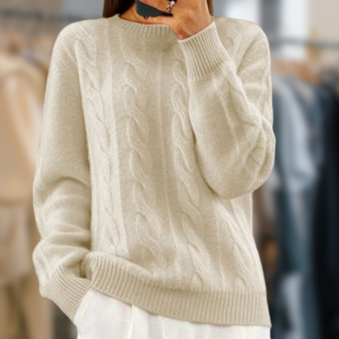 Women's cream cable knit sweater relaxed fit with ribbed trim and classic textured pattern