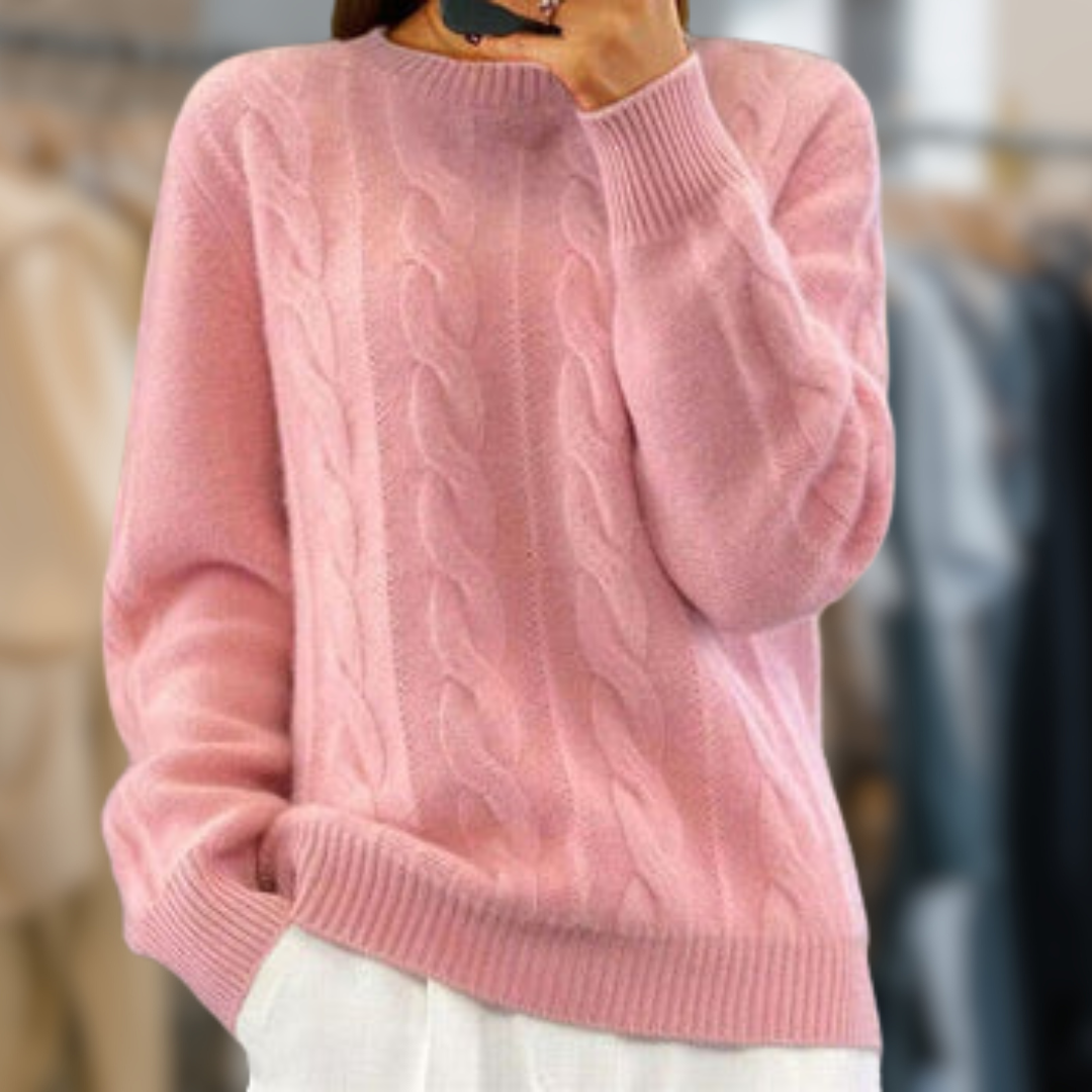 Women's relaxed cable knit sweater with ribbed trim, classic textured pattern for everyday warmth