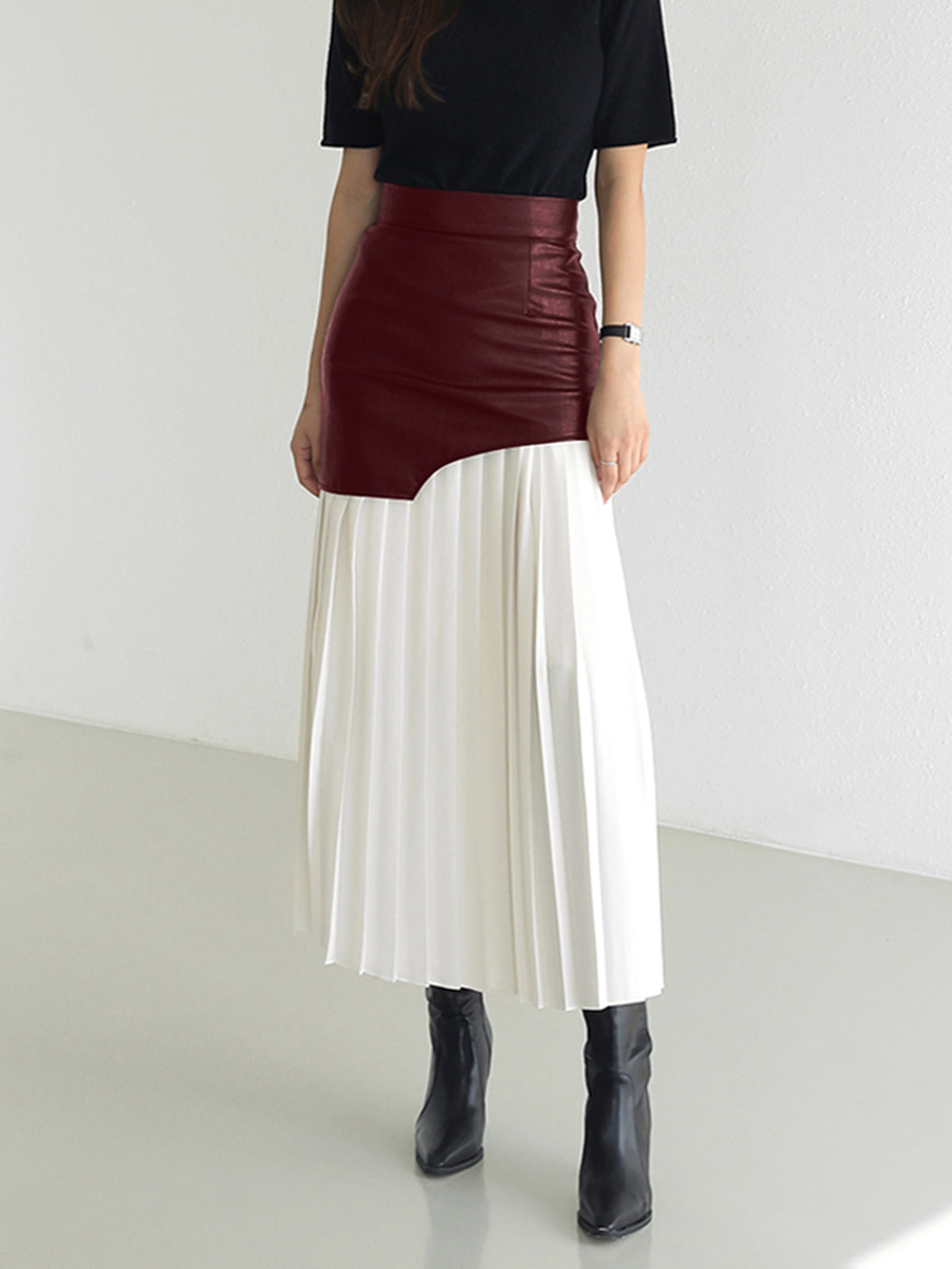 Black asymmetrical midi skirt faux leather chiffon blend dynamic silhouette urban elegant style