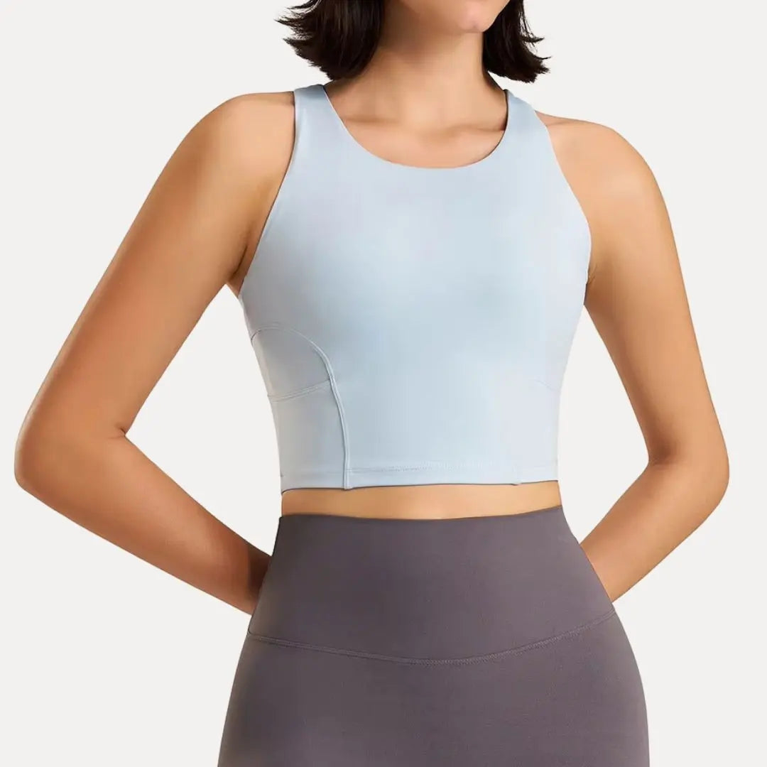 Women's black active tank top with breathable mesh back panel, moisture-wicking slim-fit performance design