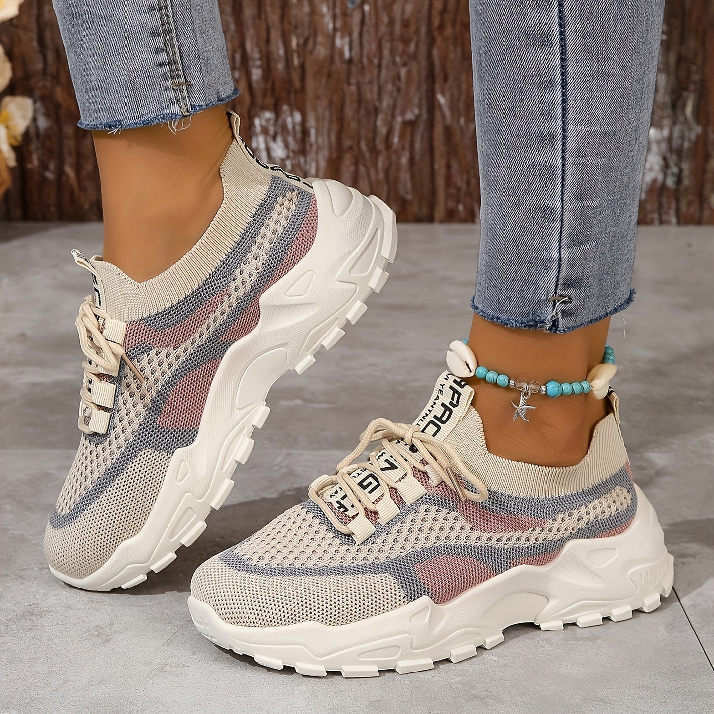 Women's breathable mesh sneakers in neutral tones, lightweight slip-on style with ventilated upper