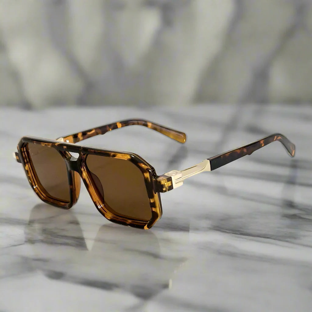 Aurelian Shades square-frame sunglasses with hexagonal lenses and gold accents for fashion-forward style