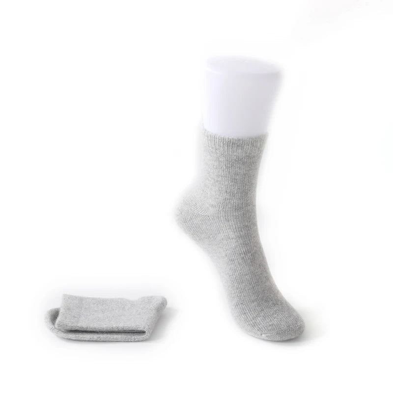 Aurora cozy cashmere socks in warm neutral tones, thick plush knit with cushioned sole for cold weather