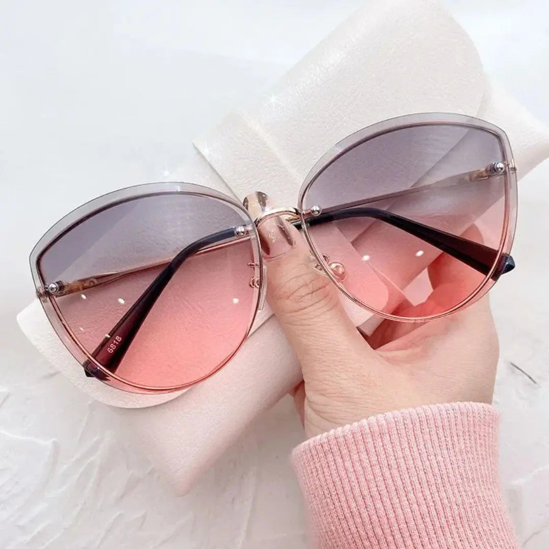 Aurora rimless cat-eye sunglasses for women, gold-tone accents, UV400 protection, elegant frameless design