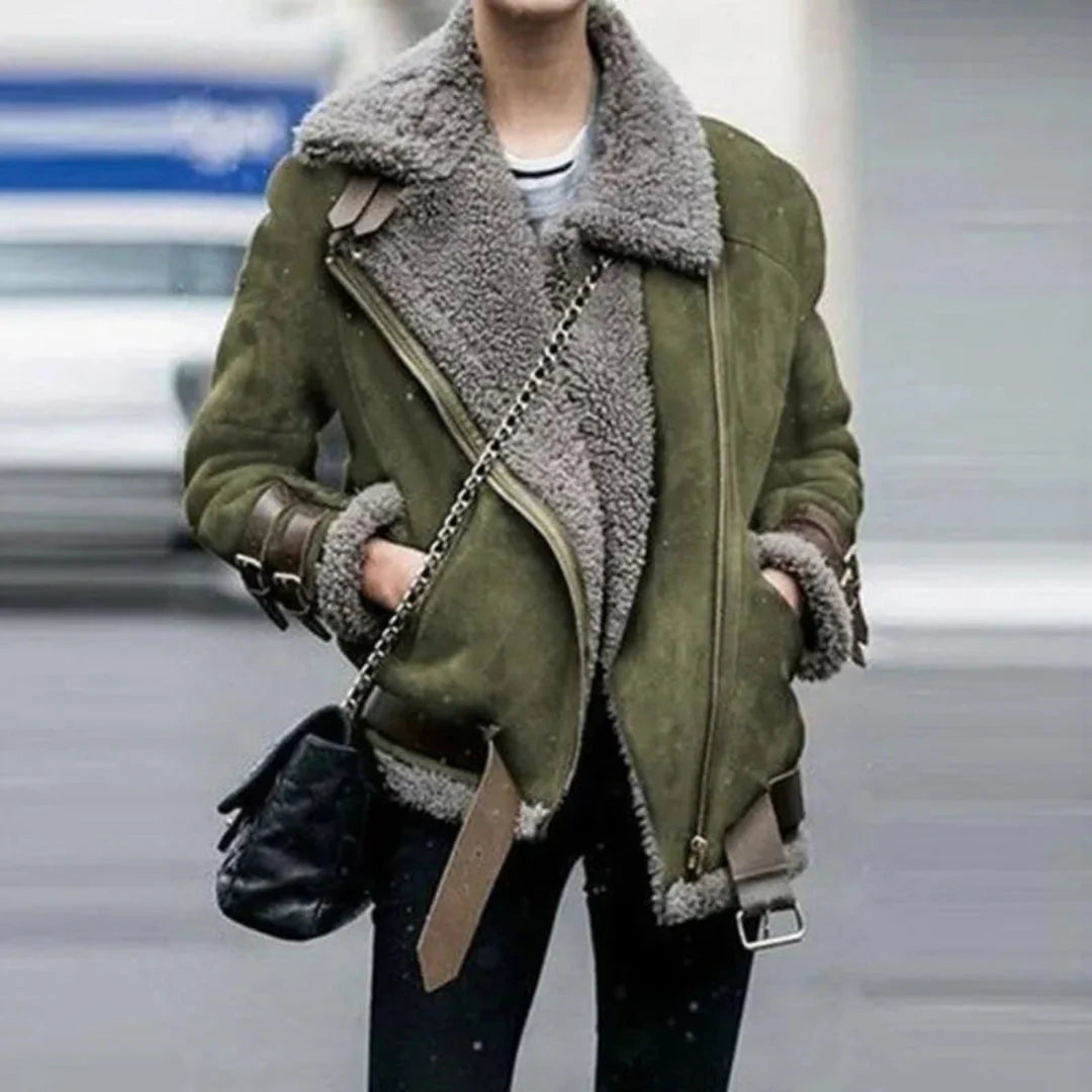Women's brown suede aviator jacket with shearling lining, asymmetrical closure, and plush faux fur interior