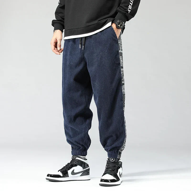 Men's slim fit jogger pants with contrasting side panels, athletic casual style for all-day comfort