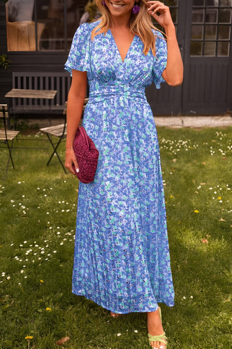 Floral maxi dress with flutter sleeves, V-neck, cinched waist in elegant summer night print