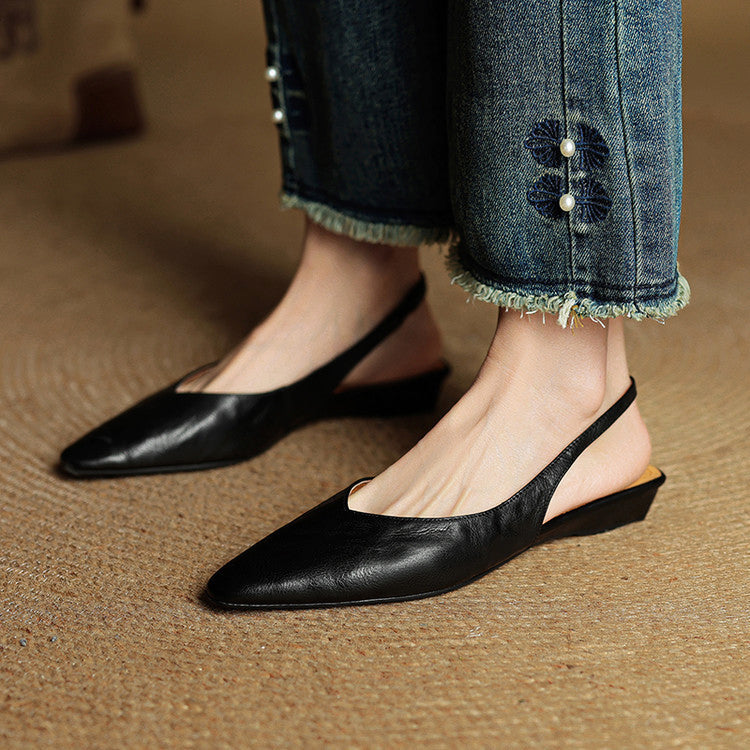 Women's beige pointed toe slingback flats in faux leather with secure ankle strap