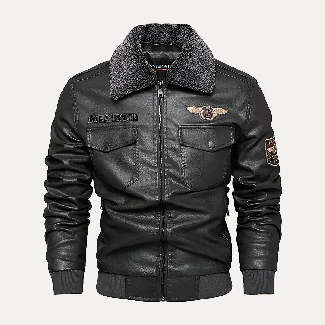 Men's brown vintage bomber leather jacket with shearling collar and heritage patch details