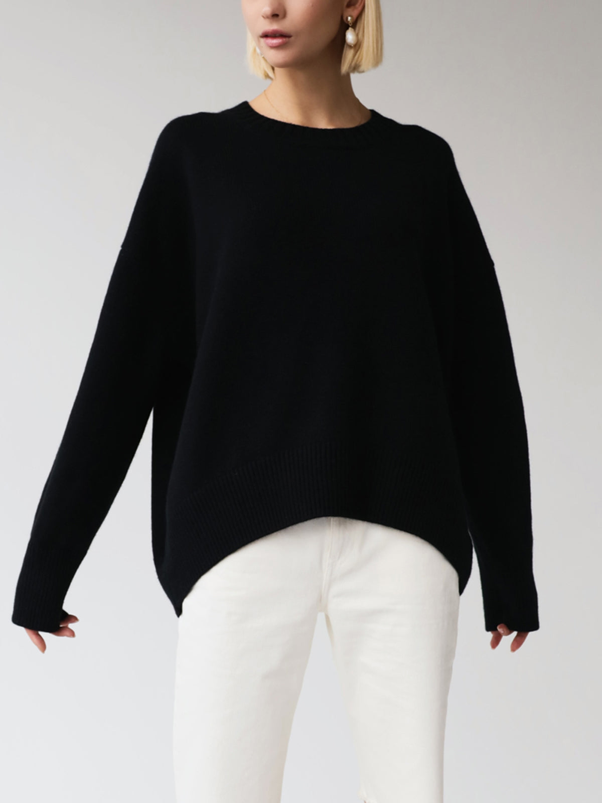 Women's oversized crewneck knit sweater relaxed fit cozy versatile layering one-size silhouette