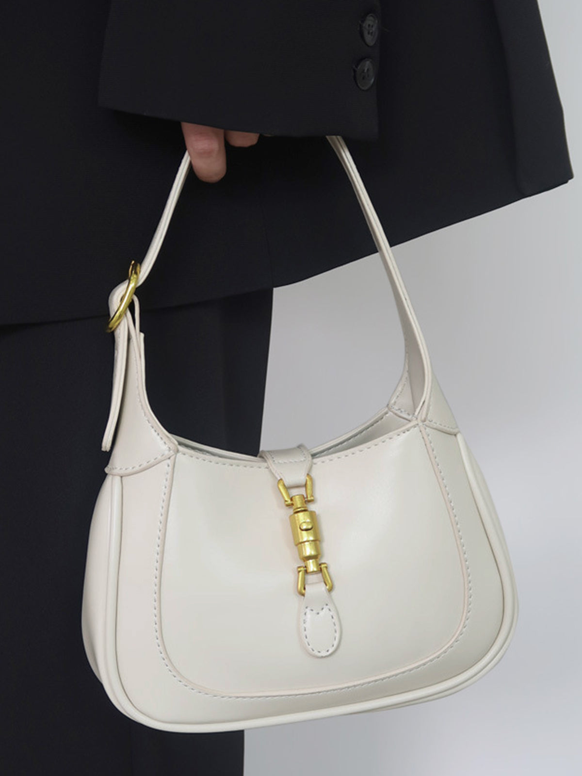 Pastel mini shoulder bag curved silhouette gold-tone hardware compact everyday chic women accessory