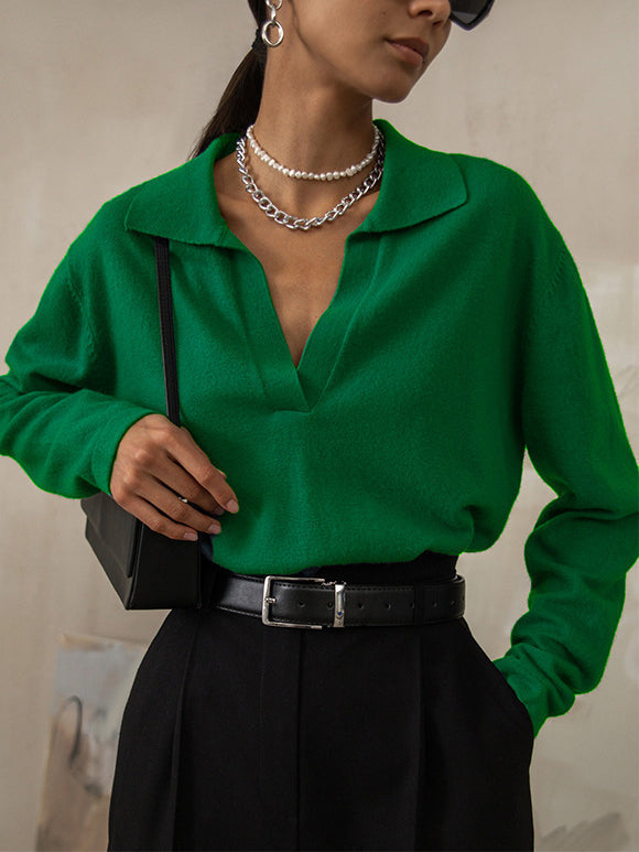 Women's soft knit V-neck sweater in neutral tone, flattering neckline for casual or elegant layering