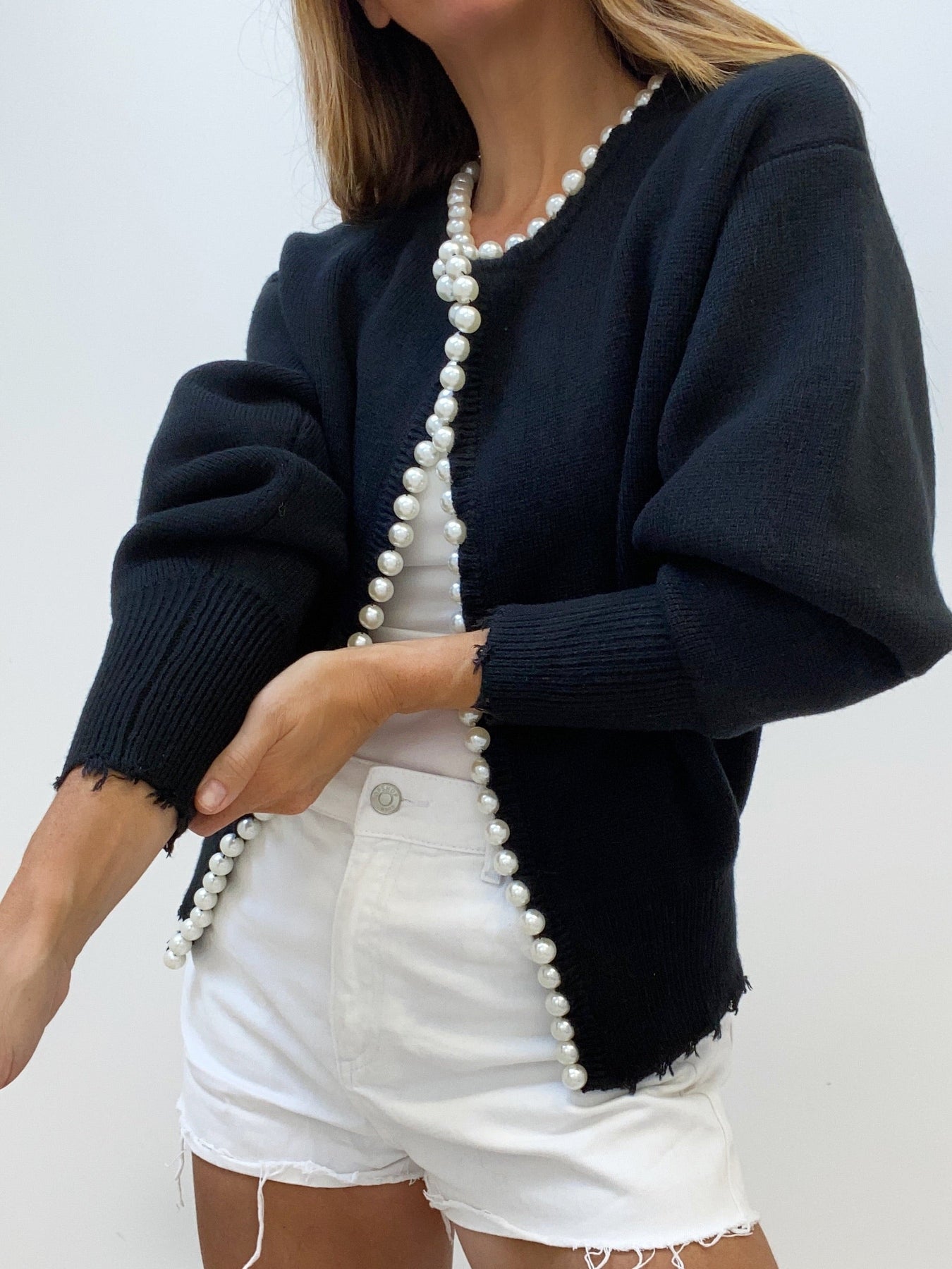 Women's soft knit cardigan with pearl trim detailing, classic round neckline, polished versatile layering