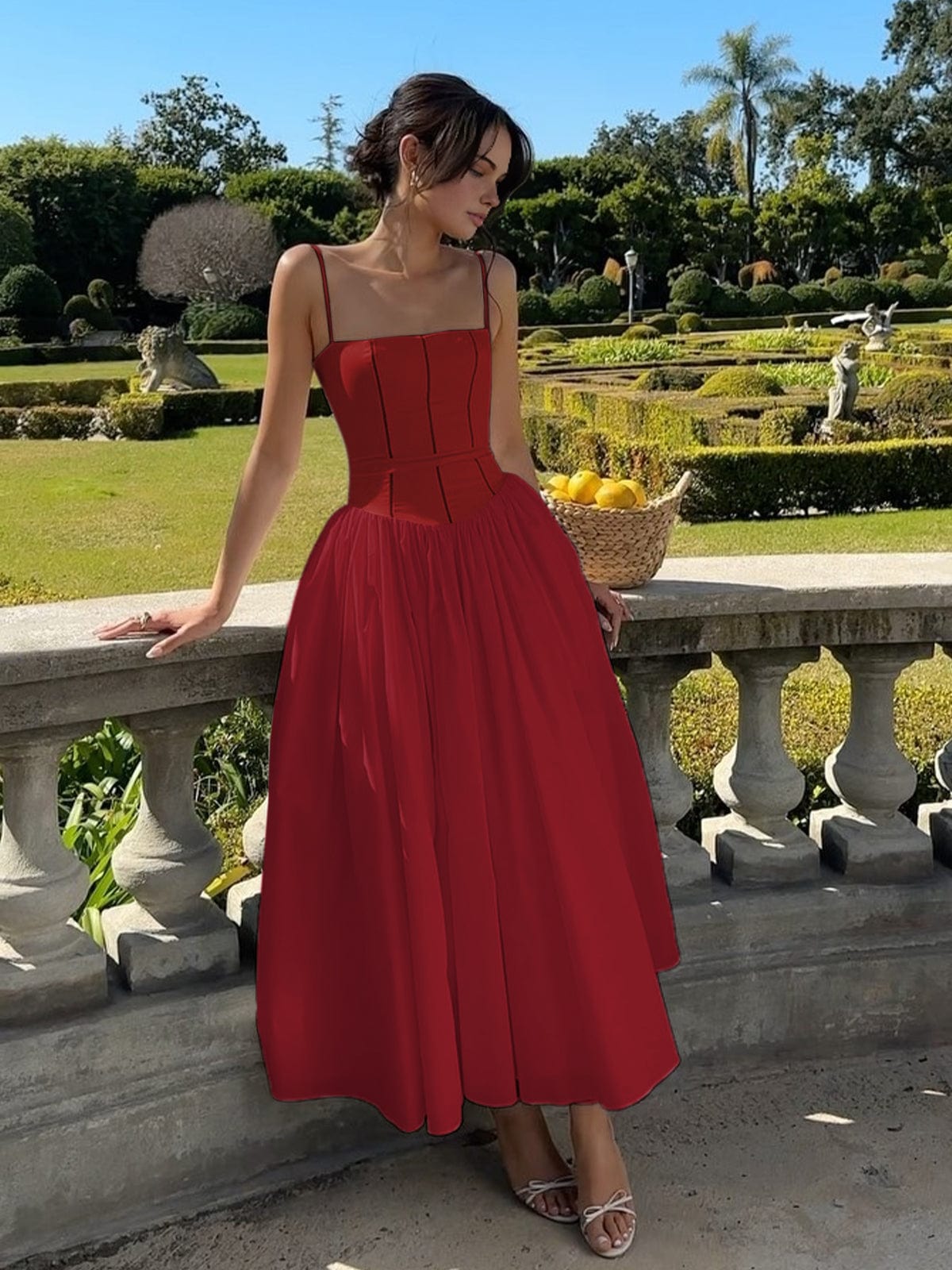 Women's elegant satin long A-line dress with fitted bodice and delicate spaghetti straps