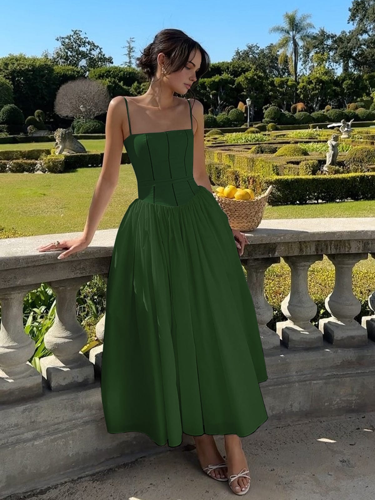 Women's elegant satin long A-line dress with fitted bodice and delicate spaghetti straps