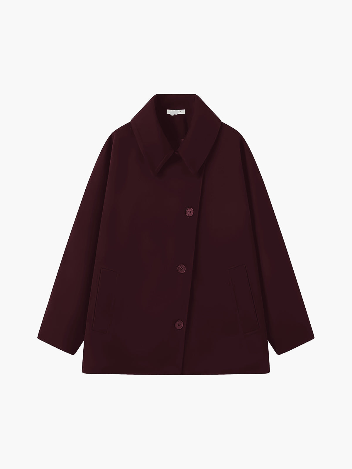 Women's oversized wool-blend coat in neutral tone, relaxed silhouette with minimal button closure