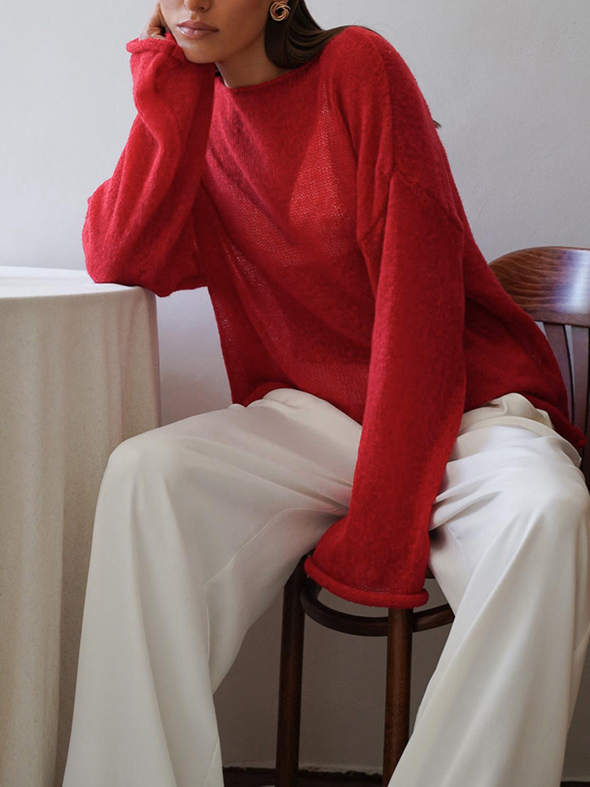 Sheer textured knit sweater relaxed silhouette lightweight ivory layer with rolled hem minimalist style