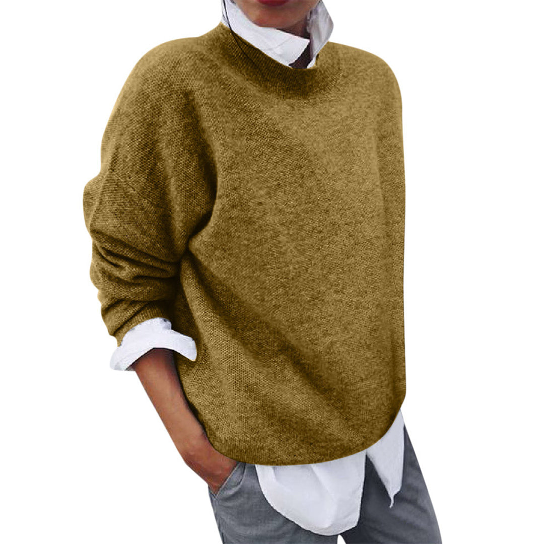 Women's relaxed fit winter knit sweater in cozy neutral tones with classic knit texture for layering