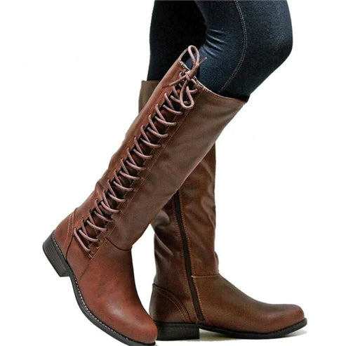 Women's knee-high boots with lace-up front detail, bold contemporary style for versatile everyday wear