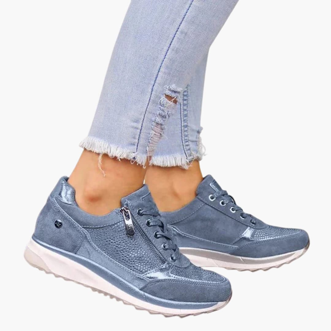 Women's lace-up sneakers with side zip, textured perforated panels and durable outsole for all-day comfort