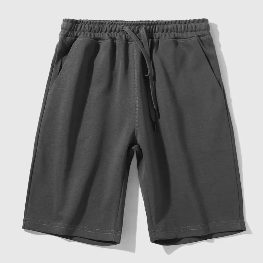 Baste drawstring jogger shorts in breathable cotton-polyester blend with relaxed fit elastic waistband