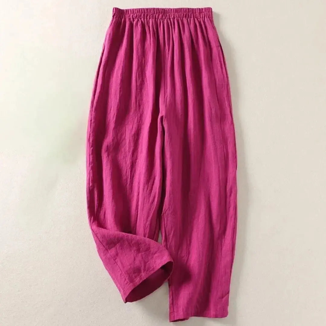 Women's lightweight linen pants in natural beige, relaxed wide-leg cut with elastic waistband for breezy summer wear