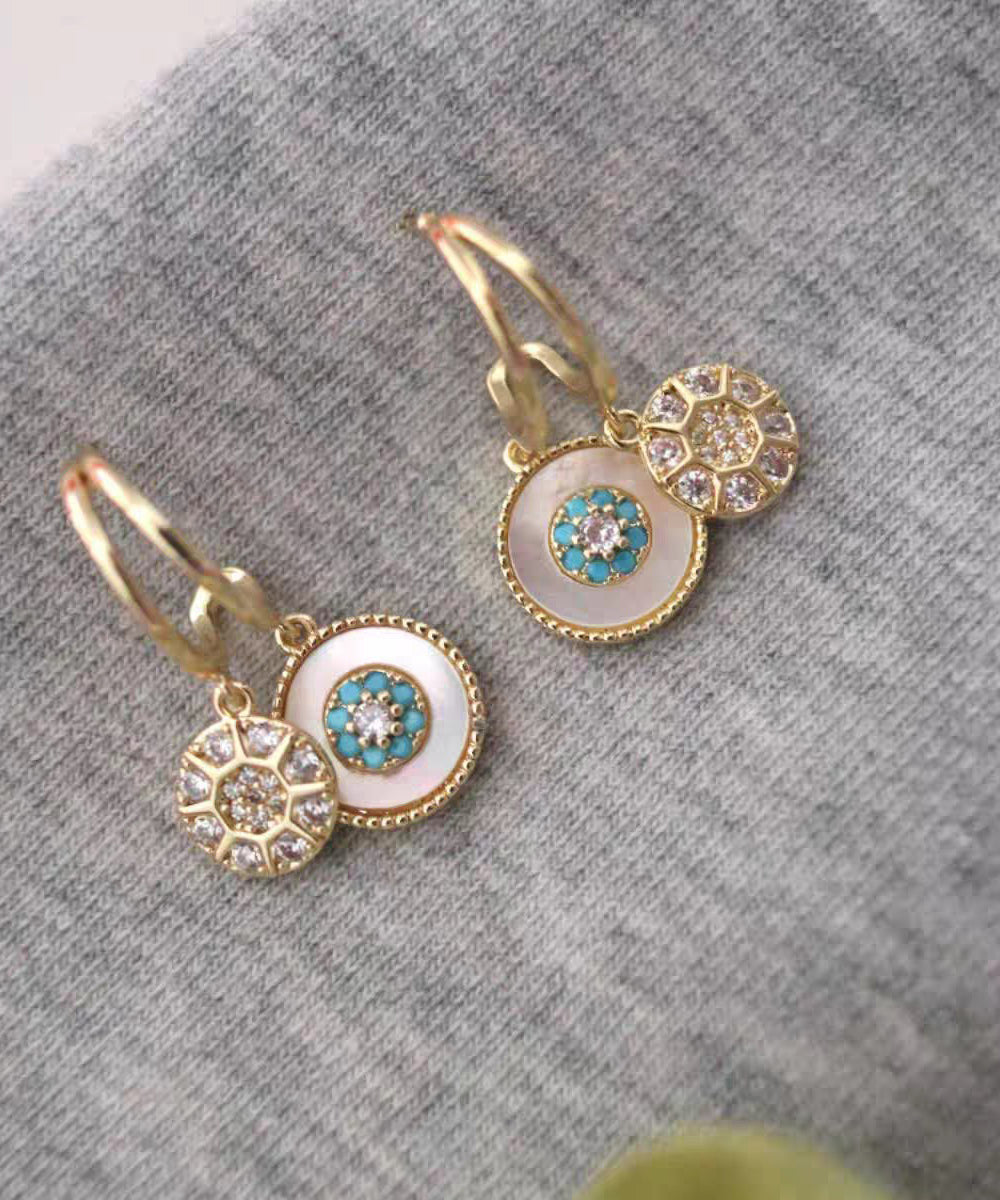 Magnifiques boucles d'oreilles pendantes en forme de coquillage en zircon surdoré et cuivre doré - Urbann-Vibe