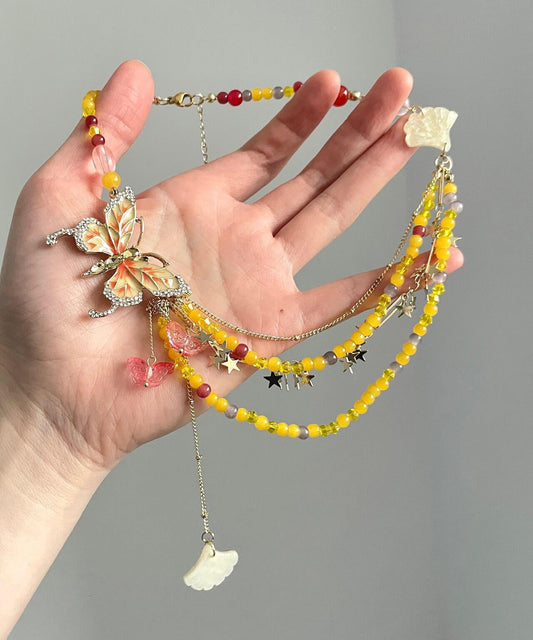 Magnifique collier avec pendentif papillon et étoile en alliage de zircon jaune - Urbann-Vibe