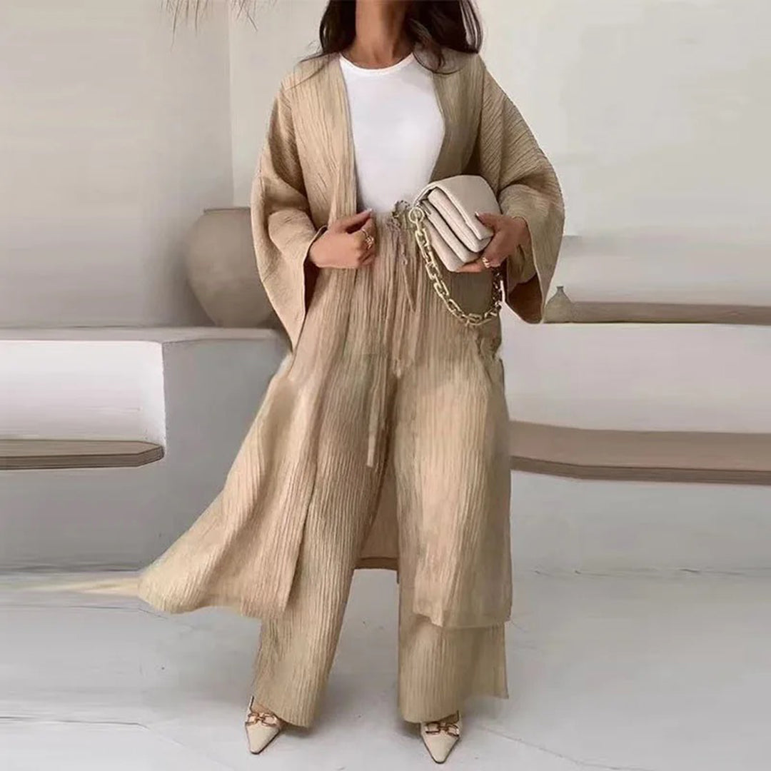 Women's elegant ivory knit two-piece cardigan set with tailored fit and luxurious coordinated layers