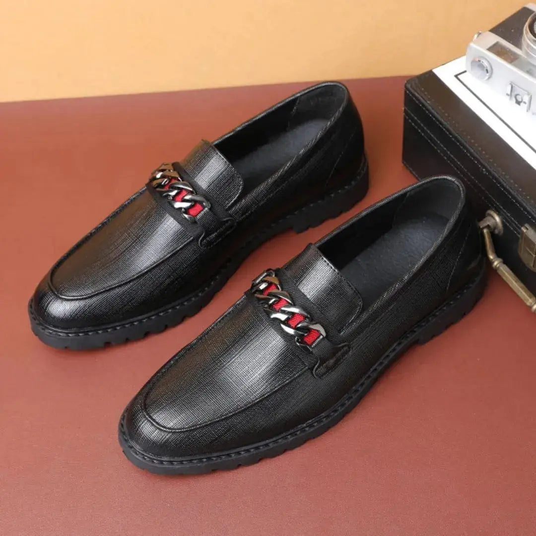 Men's textured leather loafers in classic tan with cushioned comfort and bold chain-link metal accent