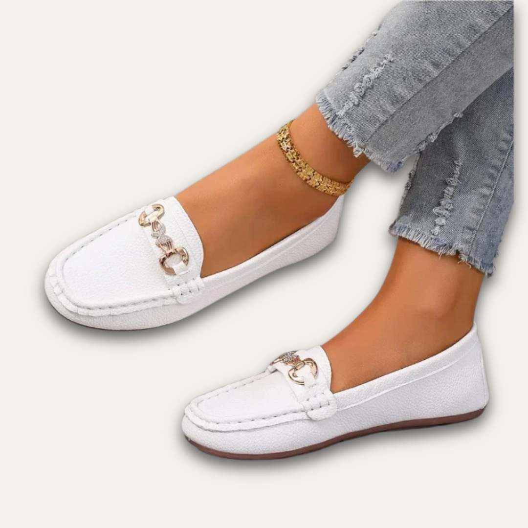 Women's flat loafers slip-on neutral tone classic silhouette with low-profile sole for everyday wear