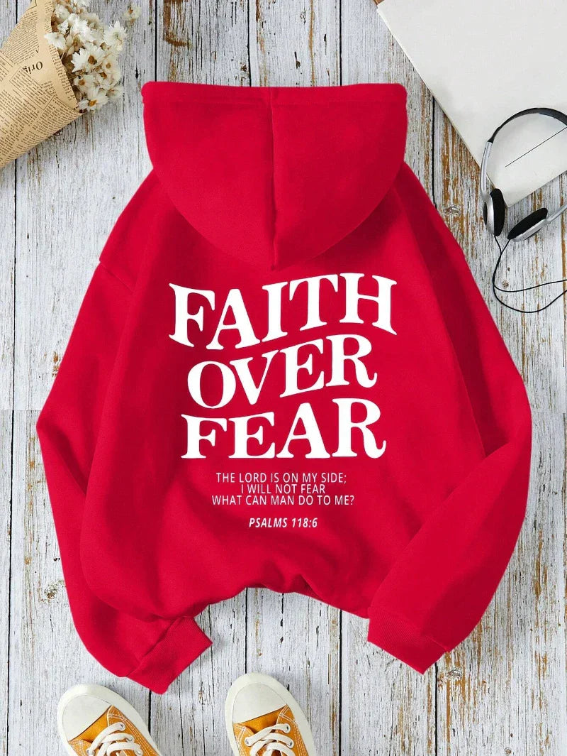 Women's cozy fleece hoodie with "Faith Over Fear" inspirational motto, perfect for everyday warmth