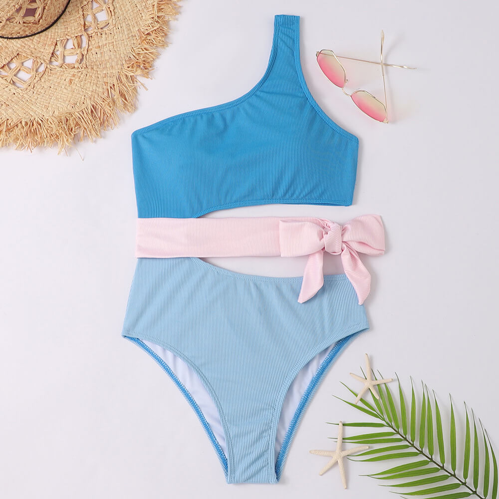 Women's ribbed one-shoulder swimsuit in solid tone with bow detail and side cutout sculpted fit