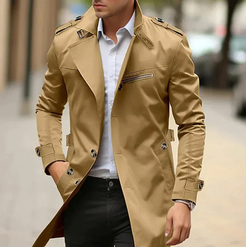 Men's slim-fit winter trench coat in classic tone with double buttons, epaulettes, and side zip pockets