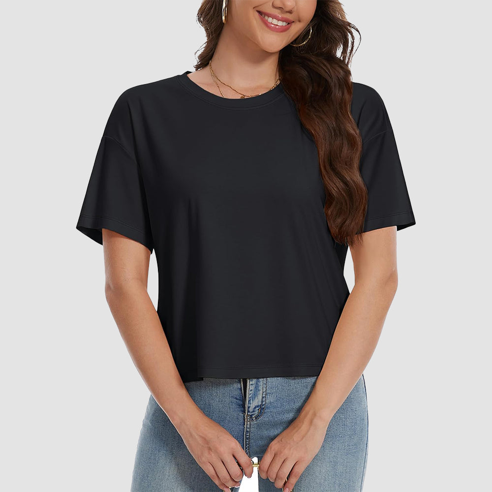 Women's white cotton crop top with UPF 50+ sun protection, relaxed fit, moisture-wicking stretch fabric