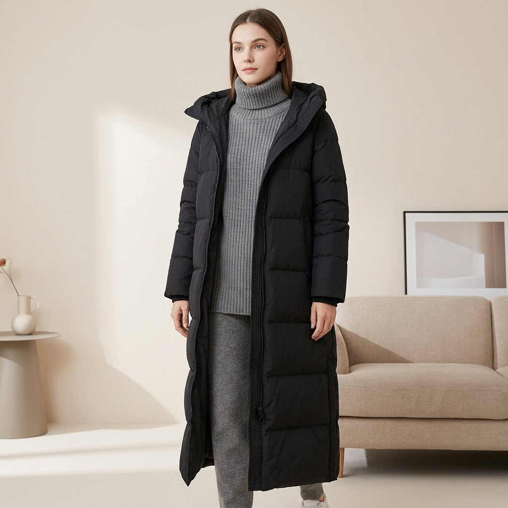 Women's black hooded quilted long down coat relaxed fit with snap closure and side pockets