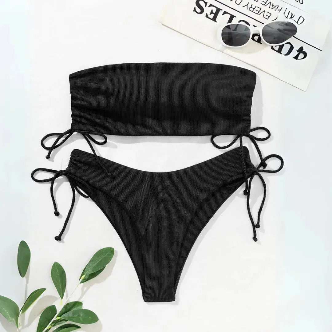 Black ribbed bandeau bikini set with side tie bottoms, strapless minimalist beachwear for women
