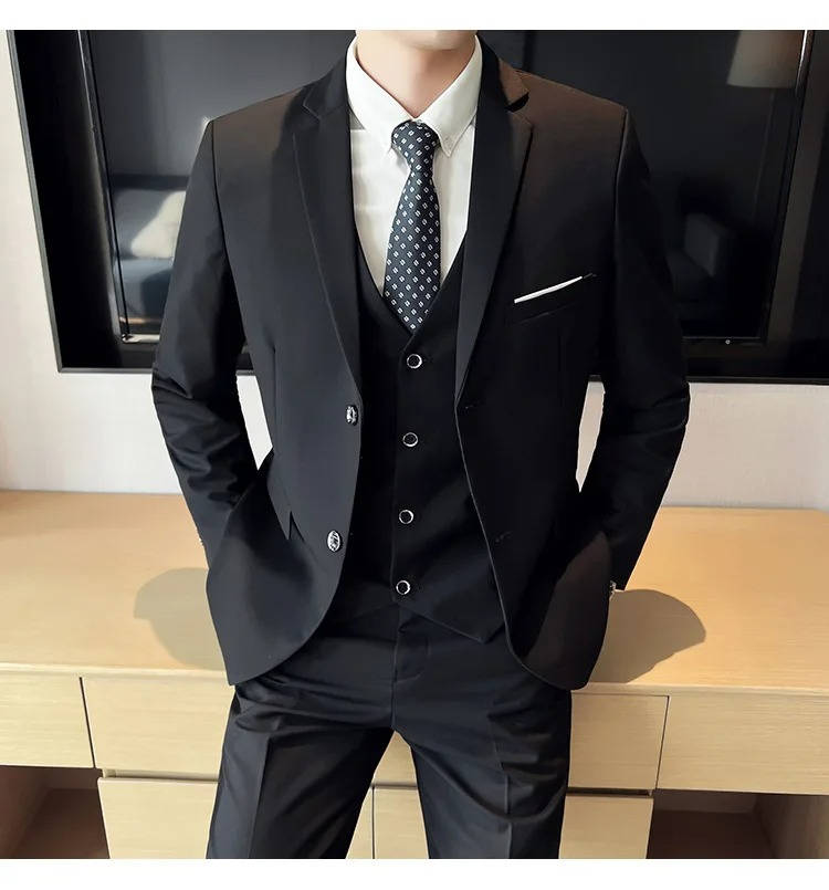 Men's slim fit three-piece suit in classic dark tone with matching vest, jacket, and tailored pants