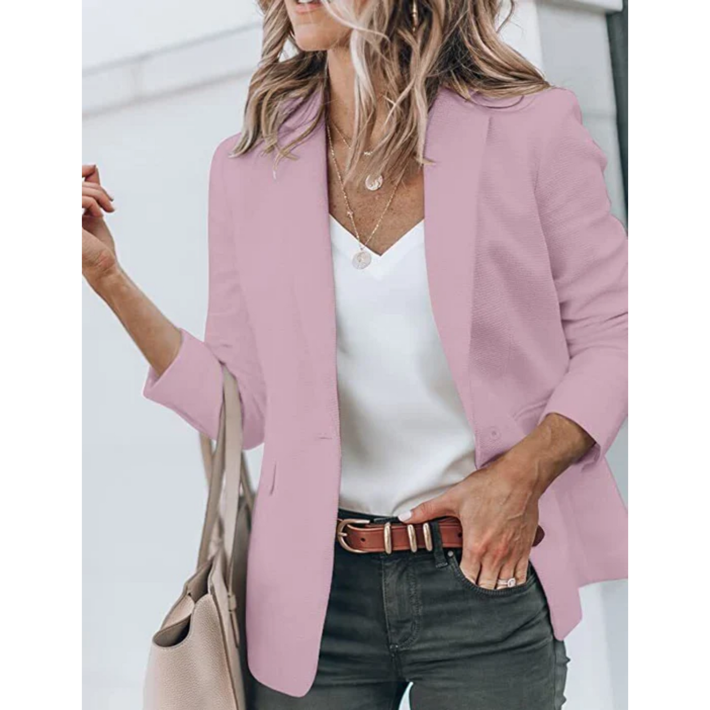 Women's open-front work blazer in neutral tone, tailored silhouette with effortless layering design