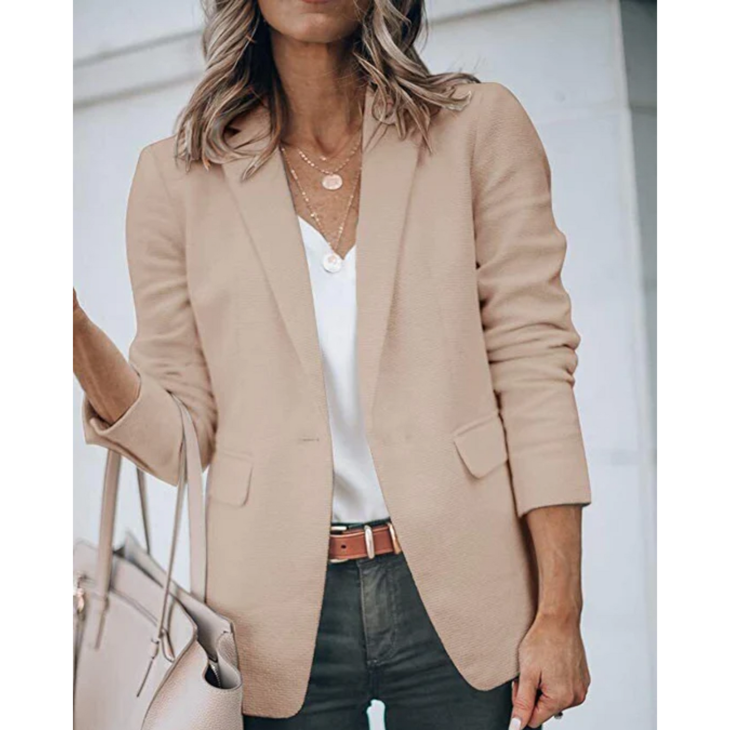 Women's open-front work blazer in neutral tone, tailored silhouette with effortless layering style