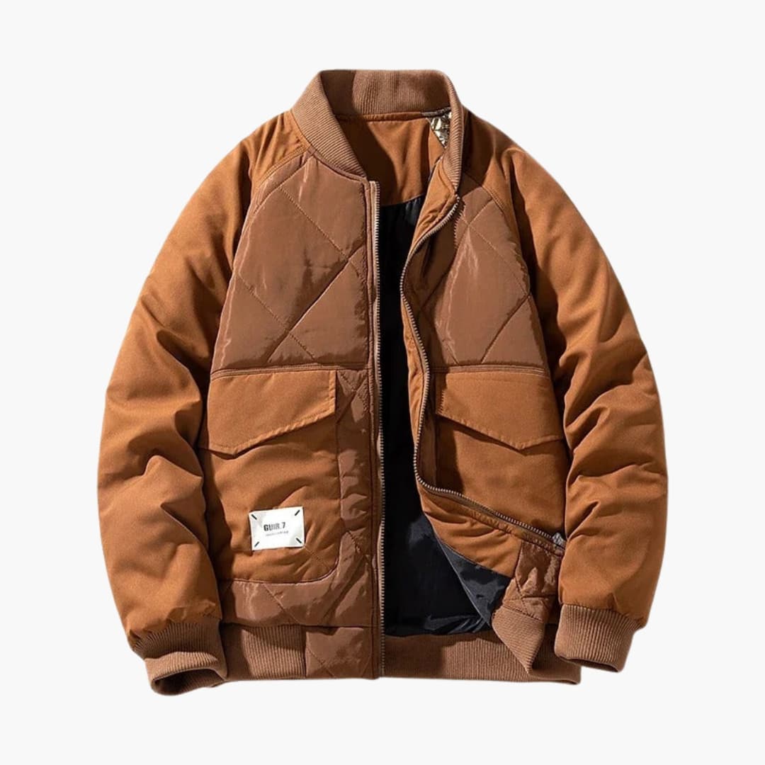 Men's quilted bomber jacket zip-up in neutral tone with flap pockets and clean silhouette