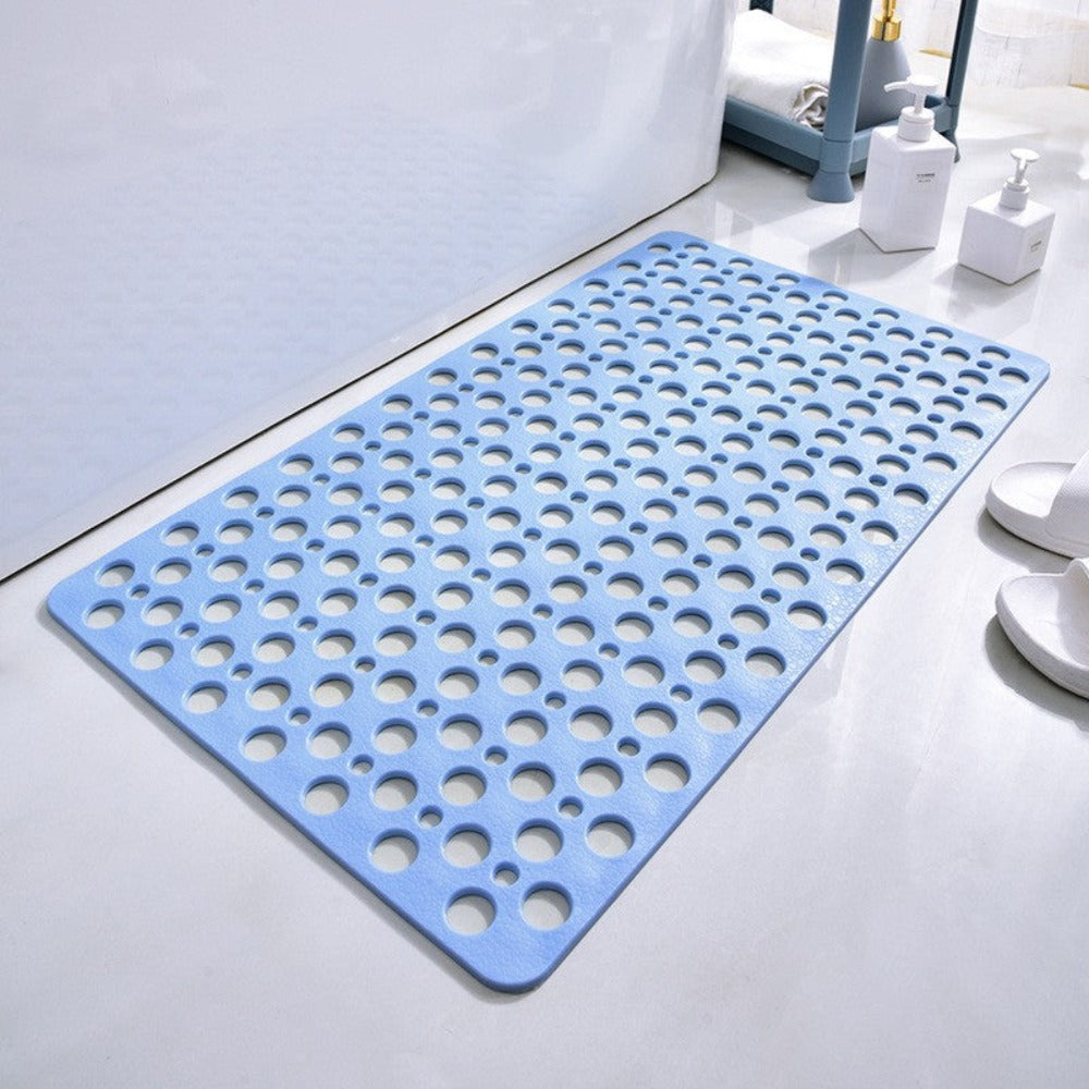 Gray non-slip rubber shower mat with drainage holes and suction cups, minimalist modern design for seniors