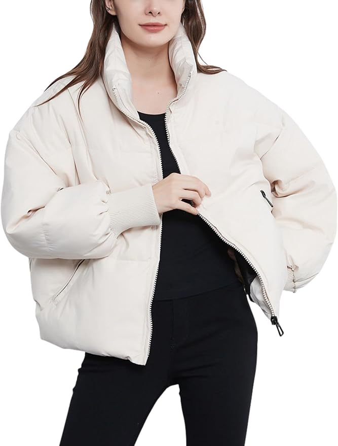 Women's lightweight quilted puffer jacket in relaxed fit with high neckline for cold-weather warmth