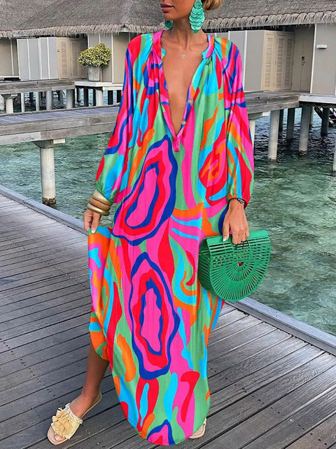 Boho maxi dress bold print flowing ankle-skimming silhouette vacation-ready lightweight breathable fabric
