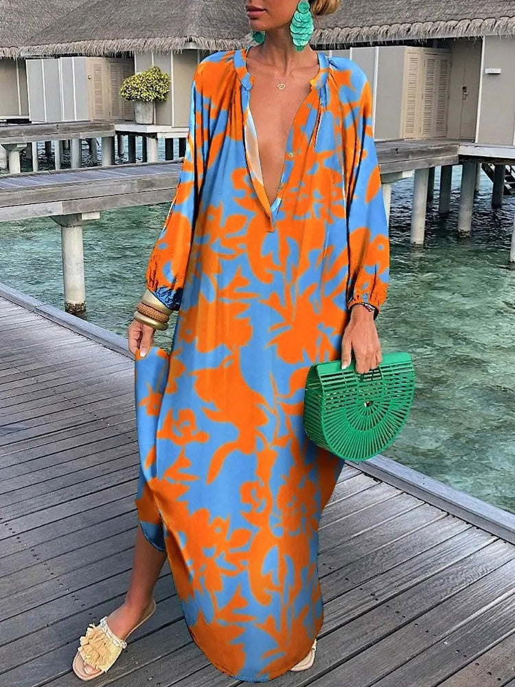 Boho maxi dress bold floral print flowing ankle-length silhouette vacation-ready lightweight fabric