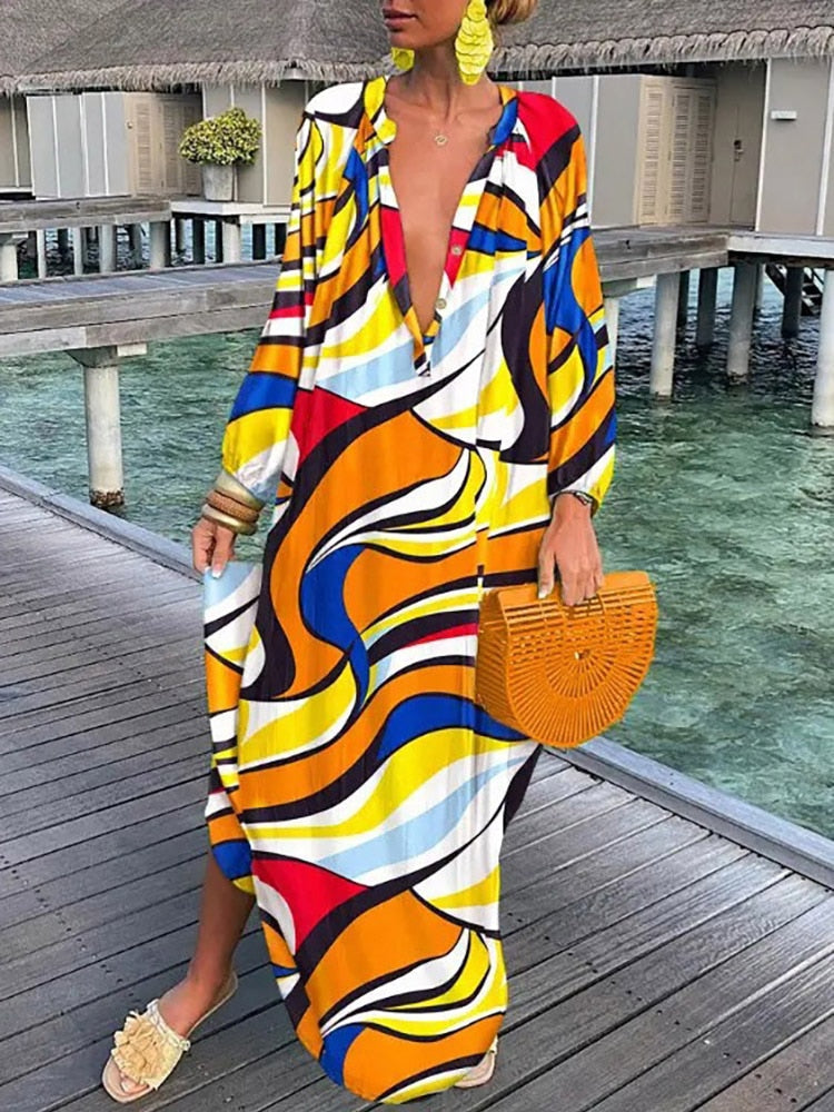 Boho maxi dress bold floral print flowing ankle-length silhouette vacation-ready lightweight breathable