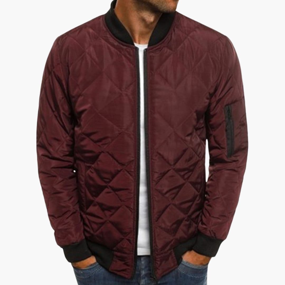 Men's black quilted bomber jacket diamond pattern full-zip closure with sleeve pocket storage