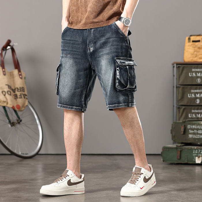 Men's blue vintage wash denim cargo shorts with spacious pockets, rugged everyday summer style